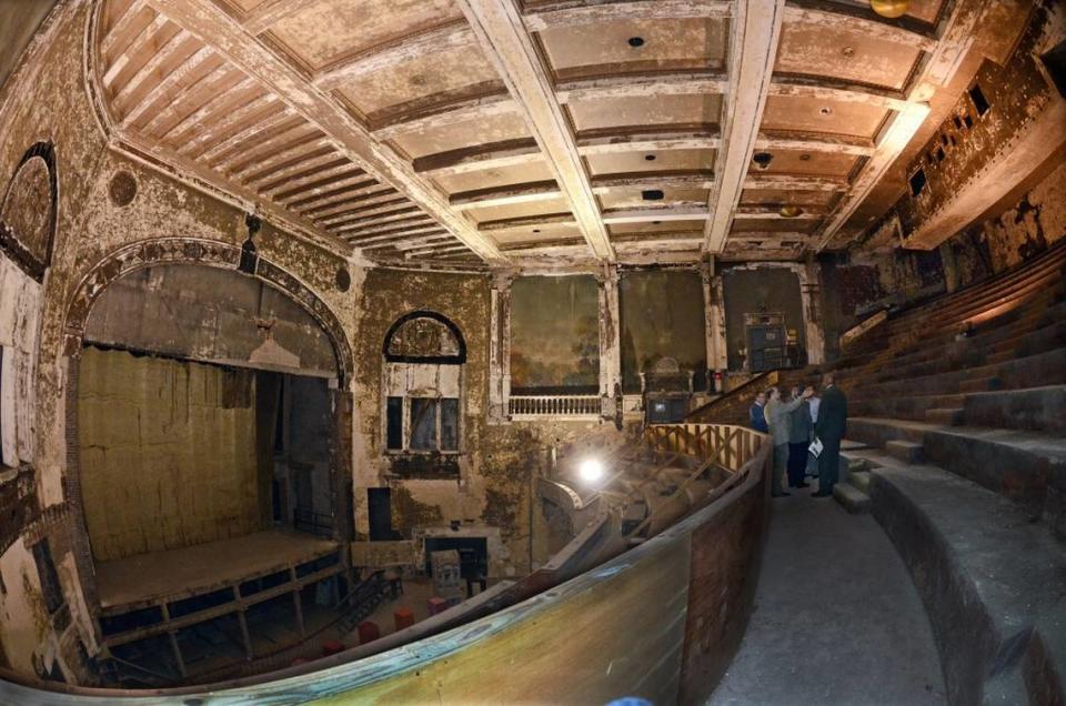 City officials took a tour of the old Carolina Theatre in 2012 to get an idea of how much of the aging structure could be redeveloped. Renovations are still underway.