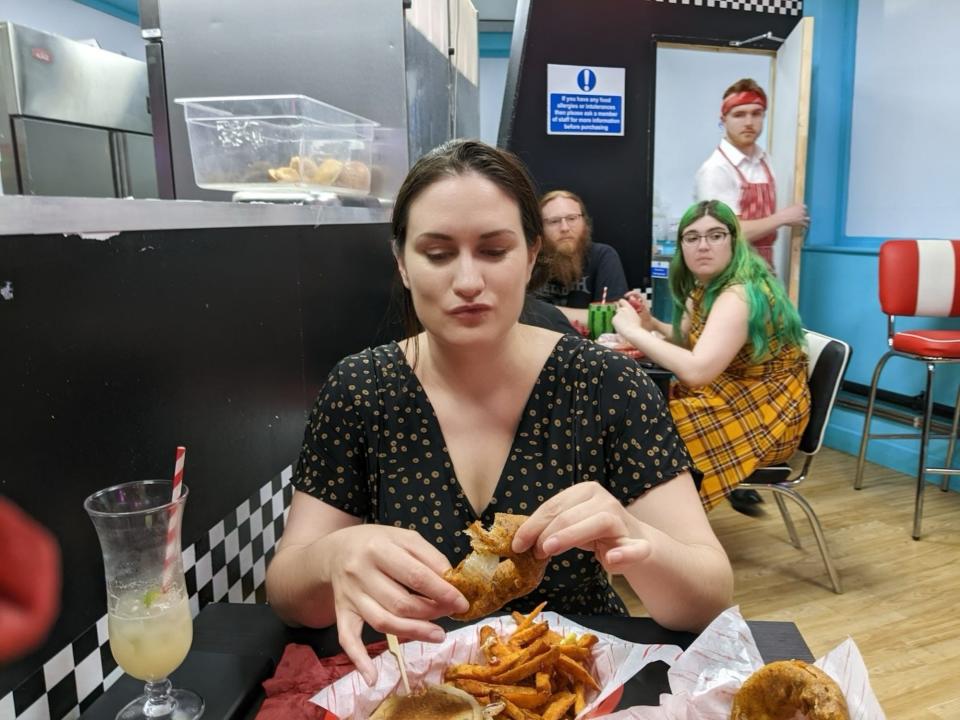 the author eating onion rings at Karen's diner