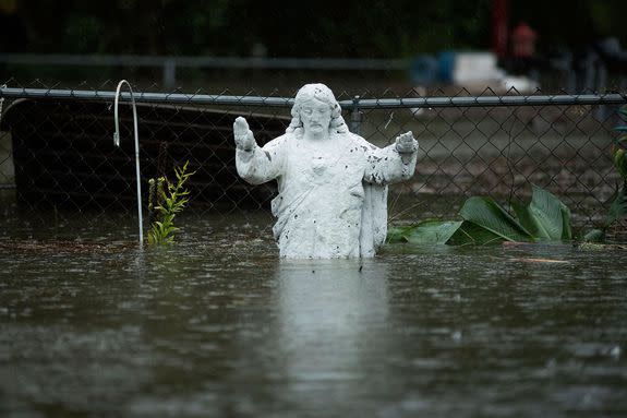 A statue reaches above Florence's floodwaters in North Carolina.