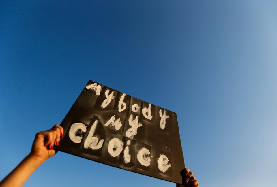 Abortion rights activists marched from the Park Central Square to the Federal Courthouse in Downtown Springfield on Friday, June 24, 2022 after the U.S. Supreme Court overturned Roe v. Wade. 