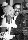 <p>Sammy Davis Jr. congratulates his friend, Mickey Rooney, as he joins him backstage after his Broadway performance in <em>Sugar Babies</em> in 1981. </p>