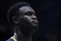 New Orleans Pelicans forward Zion Williamson (1) reacts as he walks to courtside fans to shake hands after being fouled while scoring a basket in the first half of an NBA basketball game against the Detroit Pistons in New Orleans, Wednesday, Dec. 7, 2022. (AP Photo/Gerald Herbert)