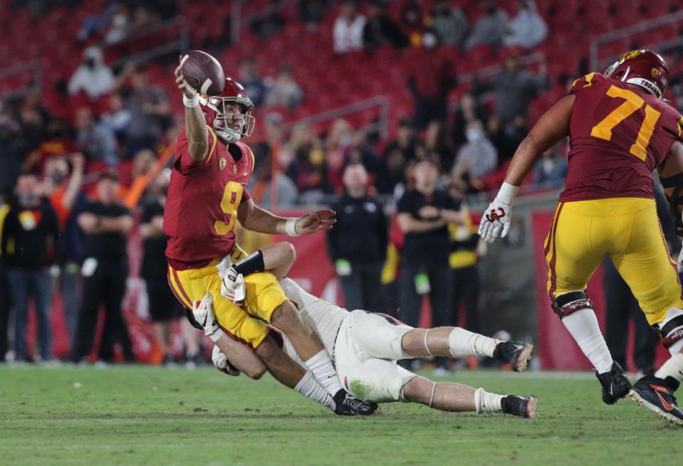 USC quarterback Kedon Slovis gets sacked by Oregon State linebacker Riley Sharp