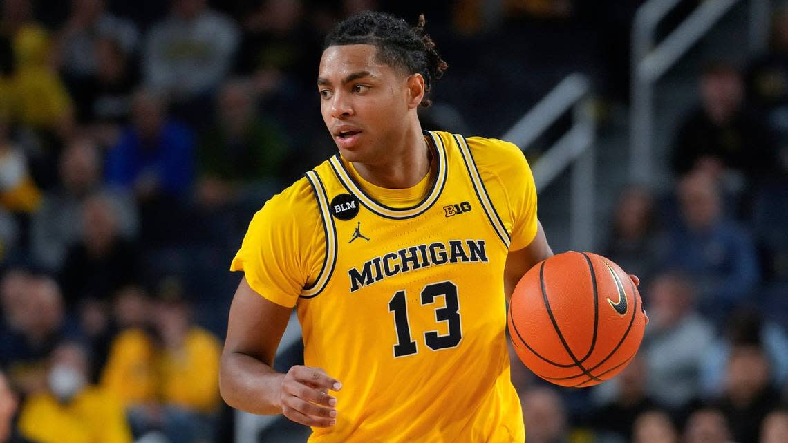 Michigan freshman Jett Howard (13) is averaging 15.1 points and making 50.7 percent of his field-goal tries and 43.8 percent of his three-point attempts.