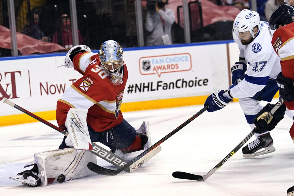 FILE - In this May 24, 2021, file photo, Florida Panthers goaltender Spencer Knight (30) stops a shot on the goal by Tampa Bay Lightning left wing Alex Killorn (17) during the first period in Game 5 of an NHL hockey Stanley Cup first-round playoff series in Sunrise, Fla. Knight went from playing in college to making an impact on his team at the most important time of the year. (AP Photo/Lynne Sladky, File)
