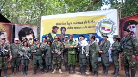 FILE PHOTO: Former FARC commander known by his alias Ivan Marquez reads a statement that they will take they insurgency once again