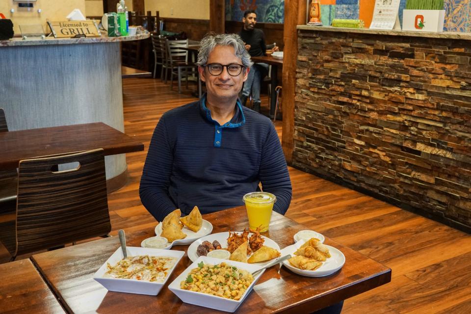 Syed Abbas with special Pakistani dishes served during Ramadan at his restaurant, Tandoori Grill, on Bethel Road on Columbus' Northwest Side.