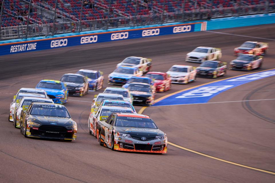 Mar 10, 2023; Avondale, AZ, USA; NASCAR ARCA Menards Series driver William Sawalich (18) leads the pack through turn 4 during the ARCA Menards General Tire 150 on Friday, March 10, 2023, at Phoenix Raceway. Mandatory Credit: Alex Gould/The Republic