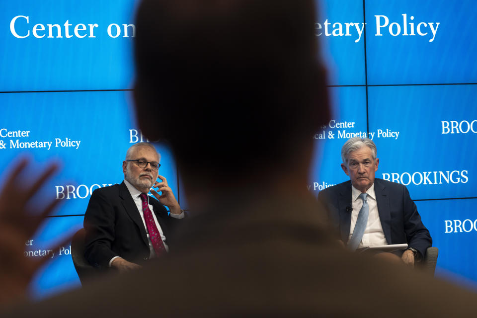 David Wessel, director of the Hutchins Center, left, and Federal Reserve Chair Jerome Powell, right, answer questions following Powell's speech at the Hutchins Center on Fiscal and Monetary Policy at the Brookings Institute on Wednesday, Nov. 30, 2022, in Washington. (AP Photo/Nathan Howard)