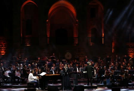 Yasmina Joumblatt, the granddaughter of the legendary singer Asmahan, and Gabriel Yared, a Lebanese composer, perform during the Beitiddine Art Festival in Beiteddine