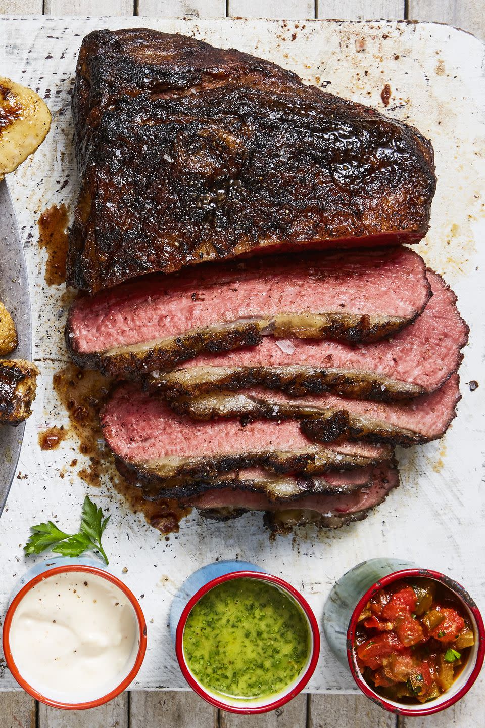 <p>This summer, try a tri-tip, the triangle of meat at the bottom of a sirloin. It's fairly tender, full of flavor and has tons of bang for your buck: perfect for a huge 4th of July party! </p><p><em><a href="https://www.goodhousekeeping.com/food-recipes/a44662/sweet-and-smoky-tri-tip-recipe/" rel="nofollow noopener" target="_blank" data-ylk="slk:Get the recipe for Sweet and Smoky Tri-Tip »;elm:context_link;itc:0;sec:content-canvas" class="link ">Get the recipe for Sweet and Smoky Tri-Tip »</a></em></p><p><strong>RELATED: </strong><a href="https://www.goodhousekeeping.com/food-recipes/cooking/how-to/a33055/best-grill-tip-for-steak-scoring/" rel="nofollow noopener" target="_blank" data-ylk="slk:The Best Trick For Grilling Steak You Haven't Heard Of;elm:context_link;itc:0;sec:content-canvas" class="link ">The Best Trick For Grilling Steak You Haven't Heard Of</a><br></p>