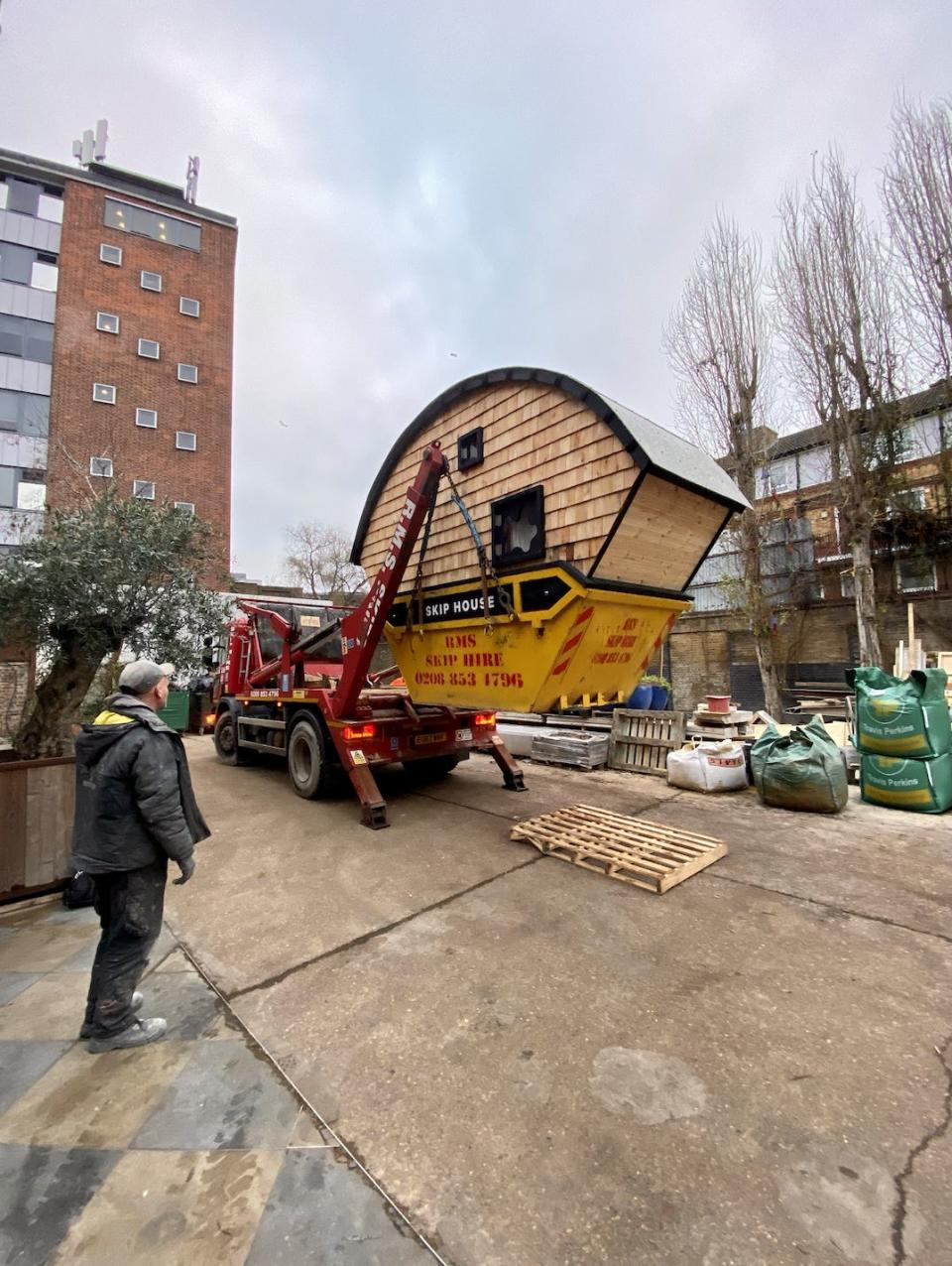 The tiny home was moved by a truck from where it was built