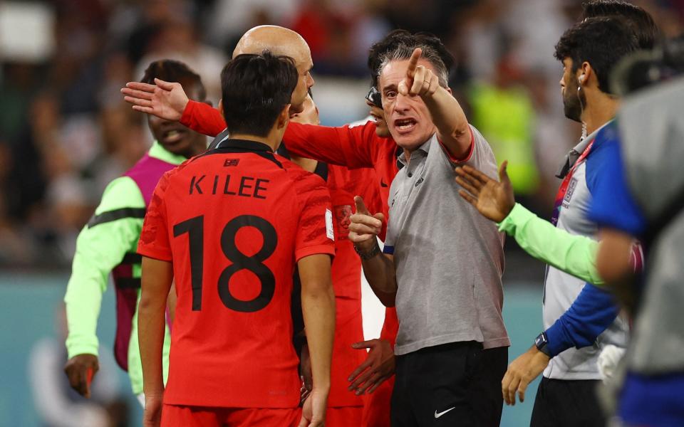 South Korea coach Paulo Bento remonstrates with referee Anthony Taylor - REUTERS