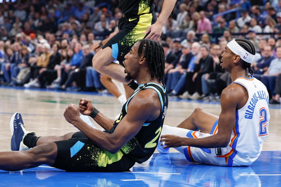 Mar 12, 2024; Oklahoma City, Oklahoma, USA; Indiana Pacers forward Aaron Nesmith (23) celebrates after an offensive foul is called against Oklahoma City Thunder guard Shai Gilgeous-Alexander (2) during the second quarter at Paycom Center. Mandatory Credit: Alonzo Adams-USA TODAY Sports