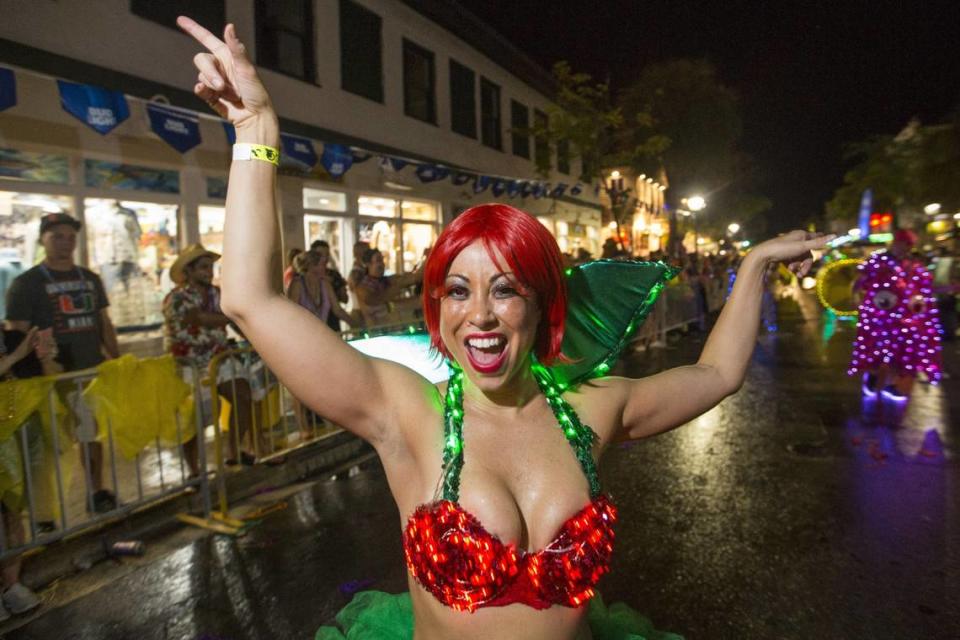 Participants partake in the 2017 Fantasy Fest parade as they make their way down Duval Street in Key West on Saturday, Oct. 28, 2017.