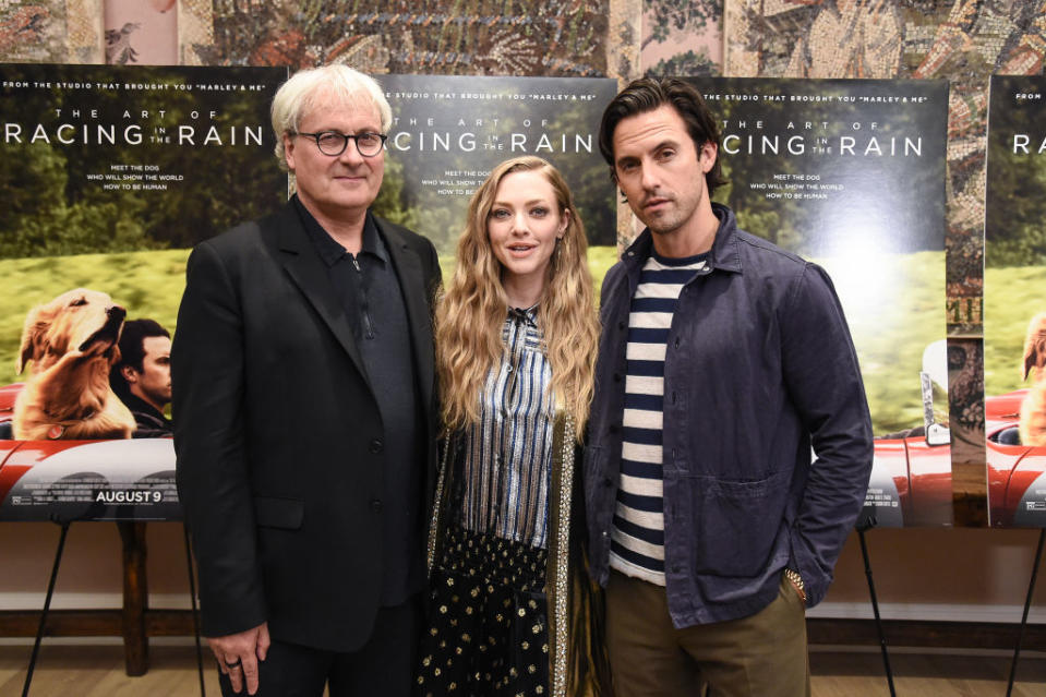 NEW YORK, NEW YORK - AUGUST 05: Simon Curtis, Amanda Seyfried and Milo Ventimiglia attend "The Art Of Racing In The Rain" New York Premiere at the Whitby Hotel on August 05, 2019 in New York City. (Photo by Steven Ferdman/WireImage)