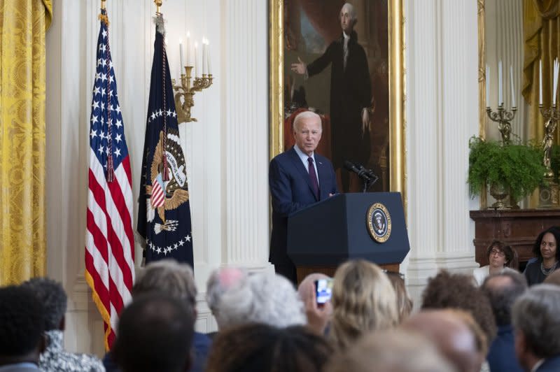 President Joe Biden urges an end to "hate-fueled violence" as he participates in a reception to commemorate the 60th Anniversary of the founding of the Lawyers' Committee for Civil Rights Under Law on Monday in the East Room of the White House in Washington, D.C. Photo by Chris Kleponis/ UPI