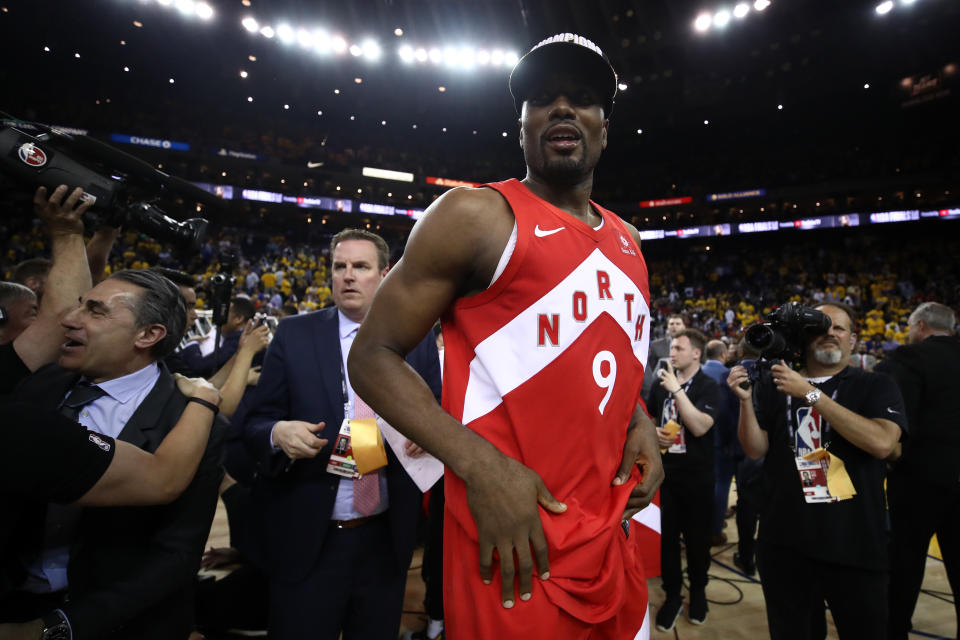 OAKLAND, CALIFORNIA - JUNE 13: Serge Ibaka #9 of the Toronto Raptors celebrates his teams win victory over the Golden State Warriors in Game Six to win the 2019 NBA Finals at ORACLE Arena on June 13, 2019 in Oakland, California. NOTE TO USER: User expressly acknowledges and agrees that, by downloading and or using this photograph, User is consenting to the terms and conditions of the Getty Images License Agreement. (Photo by Ezra Shaw/Getty Images)