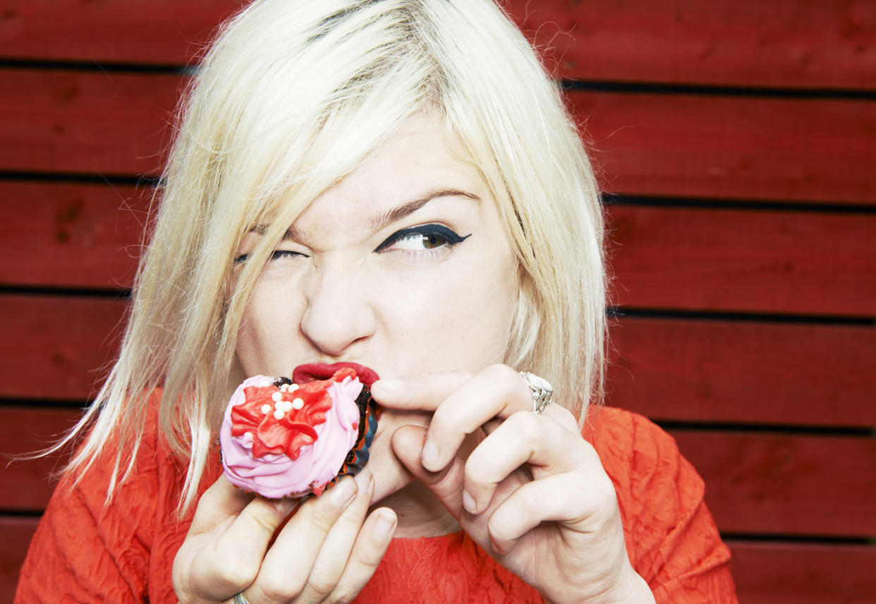 woman eating cake