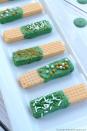 <p>These sweet, crispy wafers are super easy to make: even the kids can pitch in!</p><p>Get the <strong><a href="https://www.southernmadesimple.com/st-patricks-day-sugar-wafers/" rel="nofollow noopener" target="_blank" data-ylk="slk:St. Patrick's Day Sugar Wafers recipe;elm:context_link;itc:0;sec:content-canvas" class="link ">St. Patrick's Day Sugar Wafers recipe</a> </strong>from Southern Made Simple. </p>