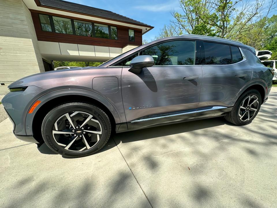 A Chevrolet Equinox EV parked in a driveway