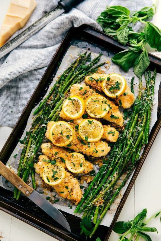 <p>Chelsea's Messy Apron</p><p>Lightly breaded garlicky lemon Parmesan chicken and asparagus all cooked in one pan.</p><p><strong>Get the recipe: <a href="https://www.chelseasmessyapron.com/one-pan-lemon-parmesan-chicken-and-asparagus-video/" rel="nofollow noopener" target="_blank" data-ylk="slk:One-Pan Lemon Parmesan Chicken and Asparagus;elm:context_link;itc:0;sec:content-canvas" class="link ">One-Pan Lemon Parmesan Chicken and Asparagus</a></strong></p>