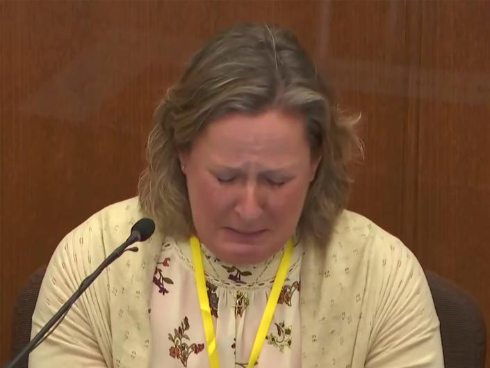 In this screen grab from video, former Minnesota police officer Kim Potter breaks down while testifying at her trial on manslaughter charges on Friday, Dec. 17, 2021.