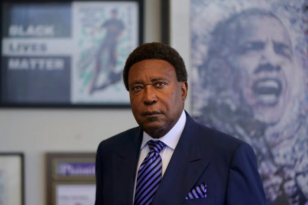 Attorney John Burris poses for photos at his office in Oakland, Calif., Tuesday, Aug. 16, 2022. For nearly 50 years, Burris has poked holes into narratives that did not add up, namely those of law enforcement accused of using excessive force. (AP Photo/Jeff Chiu)