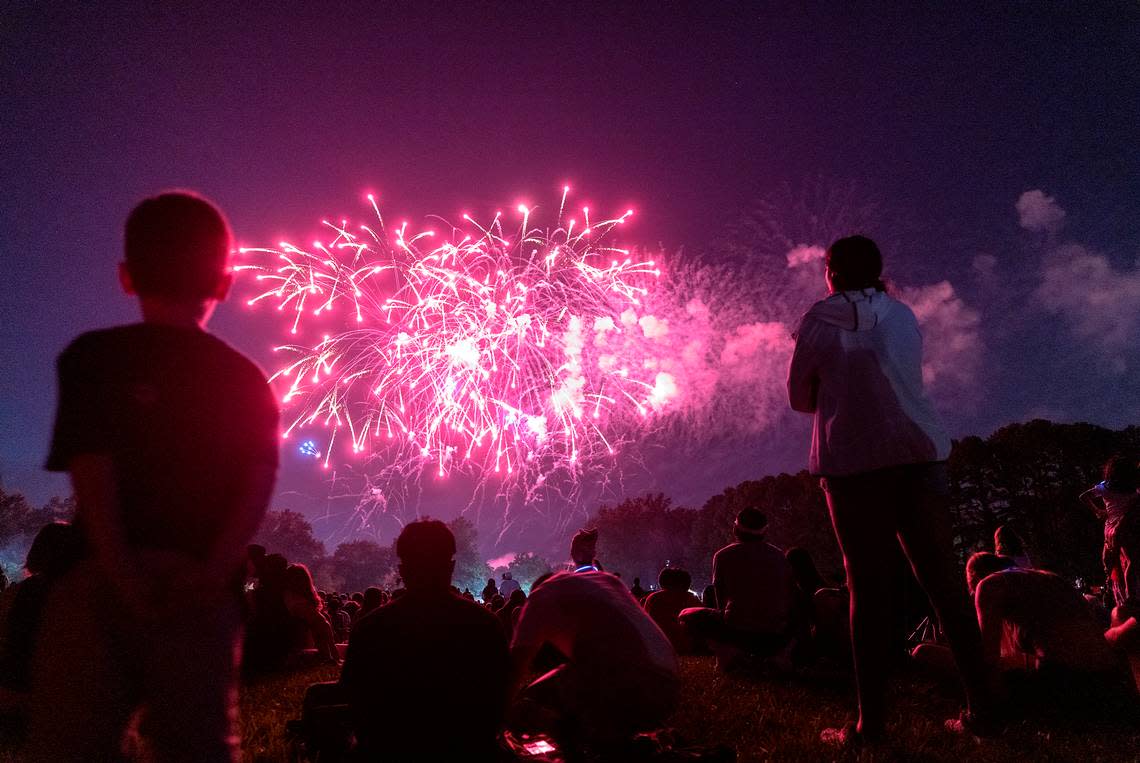 Crowds watch a fireworks display during an Independence Day celebration at Dorothea Dix Park on Tuesday, July 4, 2023, in Raleigh, N.C. Kaitlin McKeown/kmckeown@newsobserver.com