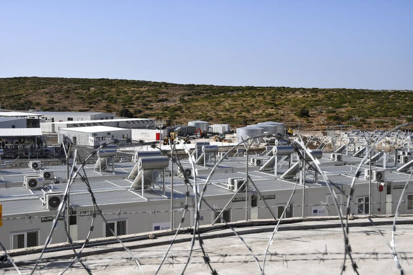 FILE - A view of the new multi-purpose reception and identification migrant centre which was constructed near Vathy town, on the eastern Aegean island of Samos, Greece, 2021.