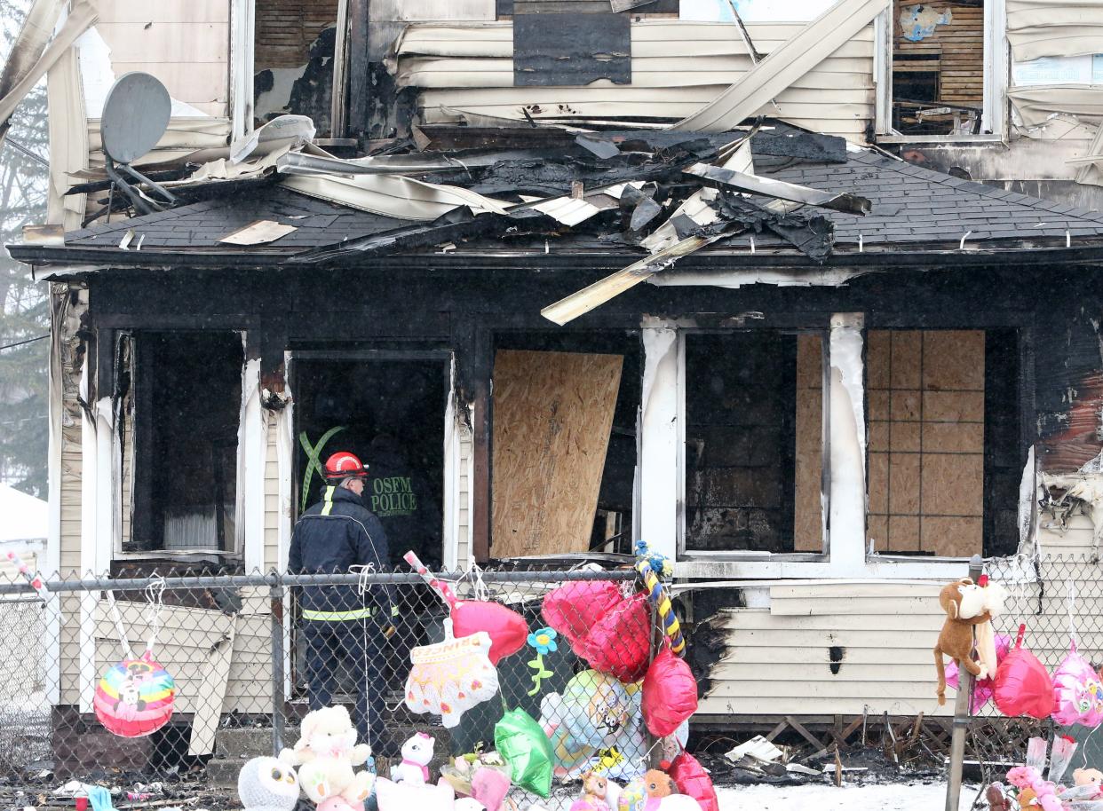 South Bend Fire Inspector Barry Sebesta stands outside the house at 222 N. LaPorte Ave. Wednesday, Jan. 24, 2024, after Sunday’s fire where five children died inside the home and a sixth died in a hospital days later.