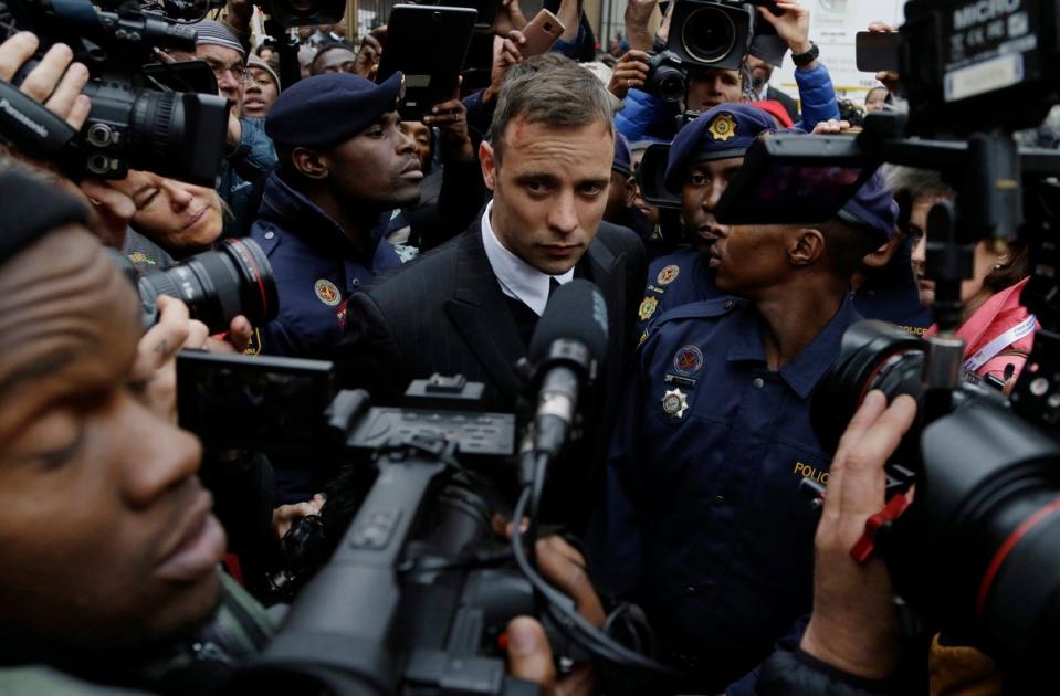 Oscar Pistorius leaves the High Court in Pretoria, South Africa, during his 2016 trial for the murder of girlfriend Reeva Steenkamp (AP)