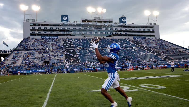 BYU Cougars wide receiver Dom Henry (86) warms up before the game against the Sam Houston Bearkats at LaVell Edwards Stadium in Provo on Sept. 2, 2023. BYU’s latest commitment comes from Cedar Valley High’s Devoux Tuataga, a three-star edge rusher.