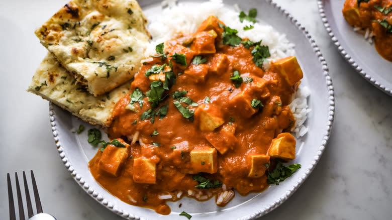 vegan tofu tikka masala garnished with cilantro