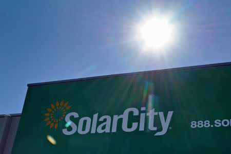 The company's logo is seen on the SolarCity building in Denver February 17, 2015. REUTERS/Rick Wilking