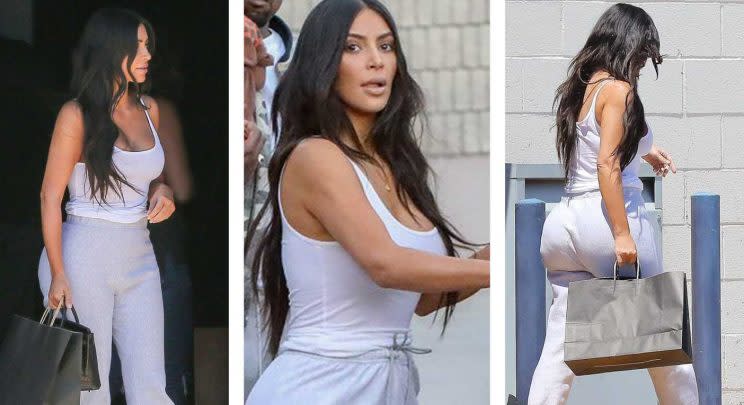 Kim Kardashian wears the same tank top and sweatpants three days in a row. [Photo: AKM-GSI]