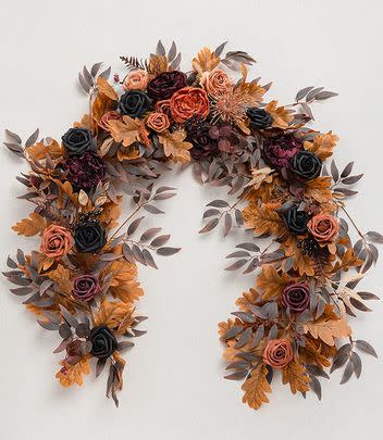 A Halloween eucalyptus garland because a lush, dark floral display is a necessary autumnal staple