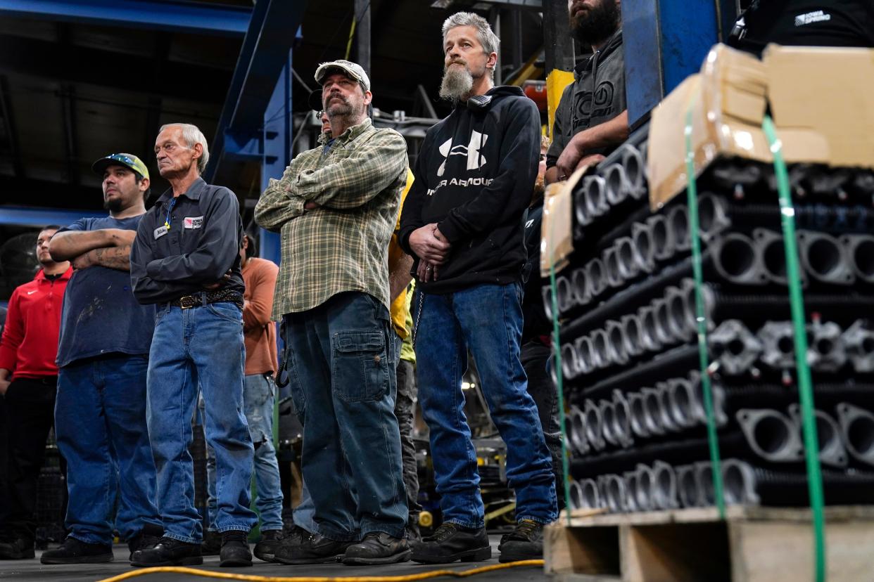 Employees at Iowa Spring Manufacturing in Adel.