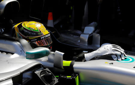 Formula One F1 - Brazilian Grand Prix 2017 - Sao Paulo, Sao Paulo - November 10, 2017. Mercedes' Lewis Hamilton of Britain sits in his car during first practice. REUTERS/Paulo Whitaker