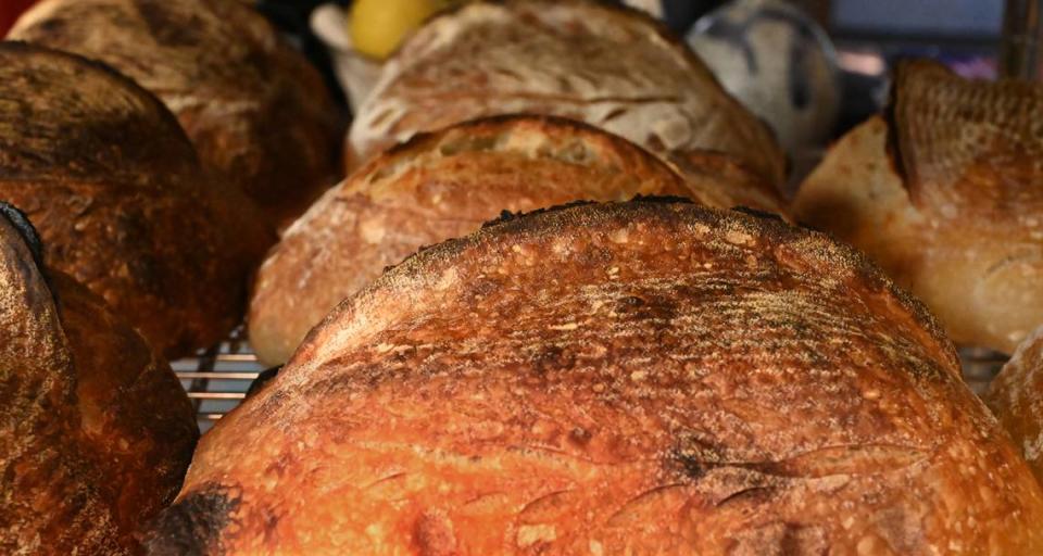 Working out of her west Olympia kitchen Meg Chernoff prepares a run of naturally leavened bread featuring regionally sourced ingredients for her customers and for sale at local outlets.