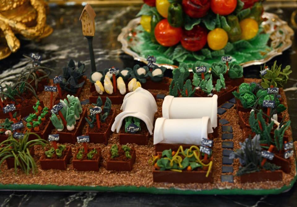 <p>Next to the gingerbread house was a miniature, edible model of First Lady Michelle Obama's vegetable garden. </p>