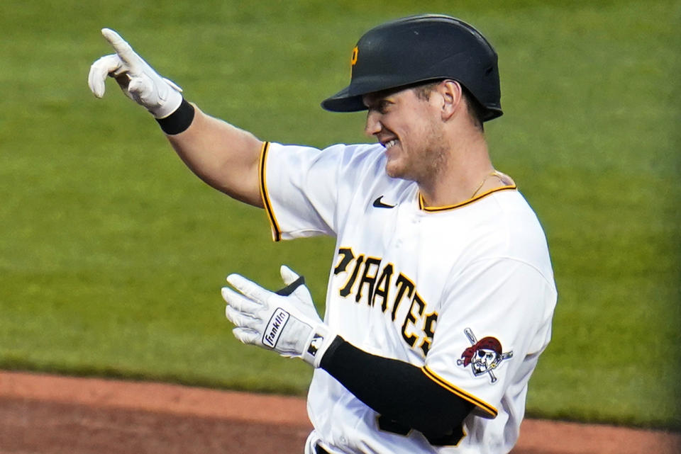 Pittsburgh Pirates' Josh VanMeter celebrates driving in a run with a double off San Diego Padres starting pitcher Sean Manaea during the fifth inning of a baseball game in Pittsburgh, Saturday, April 30, 2022. (AP Photo/Gene J. Puskar)