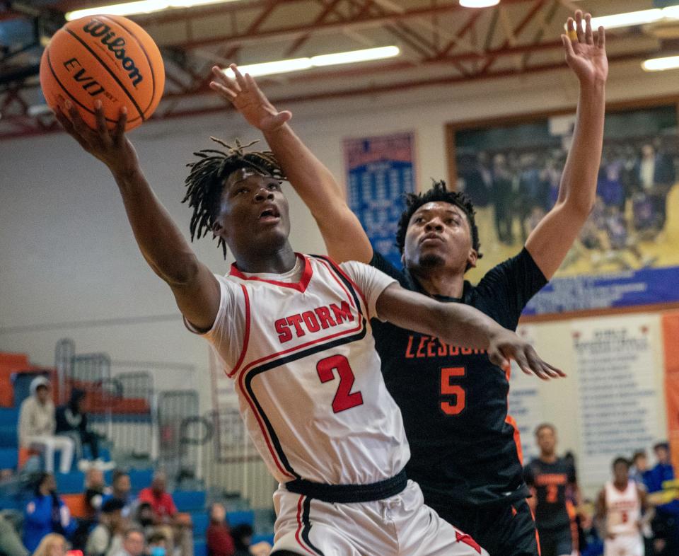 Victory Christian's Lorenzo Cason goes up for a shot against Leesburg on Saturday at the Mosaic 2022 Stinger Shootout at Bartow High School.