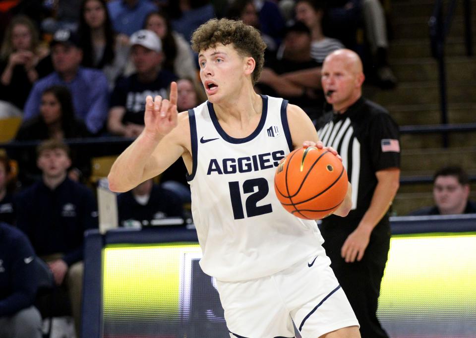 Freshman guard Mason Falslev looks to pass during the Aggies’ exhibition game against Montana State Billings on Nov. 3 at the Spectrum in Logan. | Jeff Hunter, Associated Press