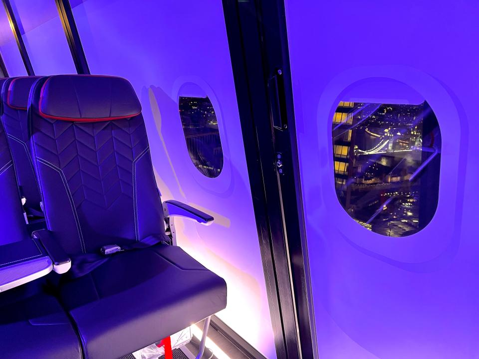 A mockup cabin shows British Airways new EuroFlyer seat design with Tower Bridge visible in the window