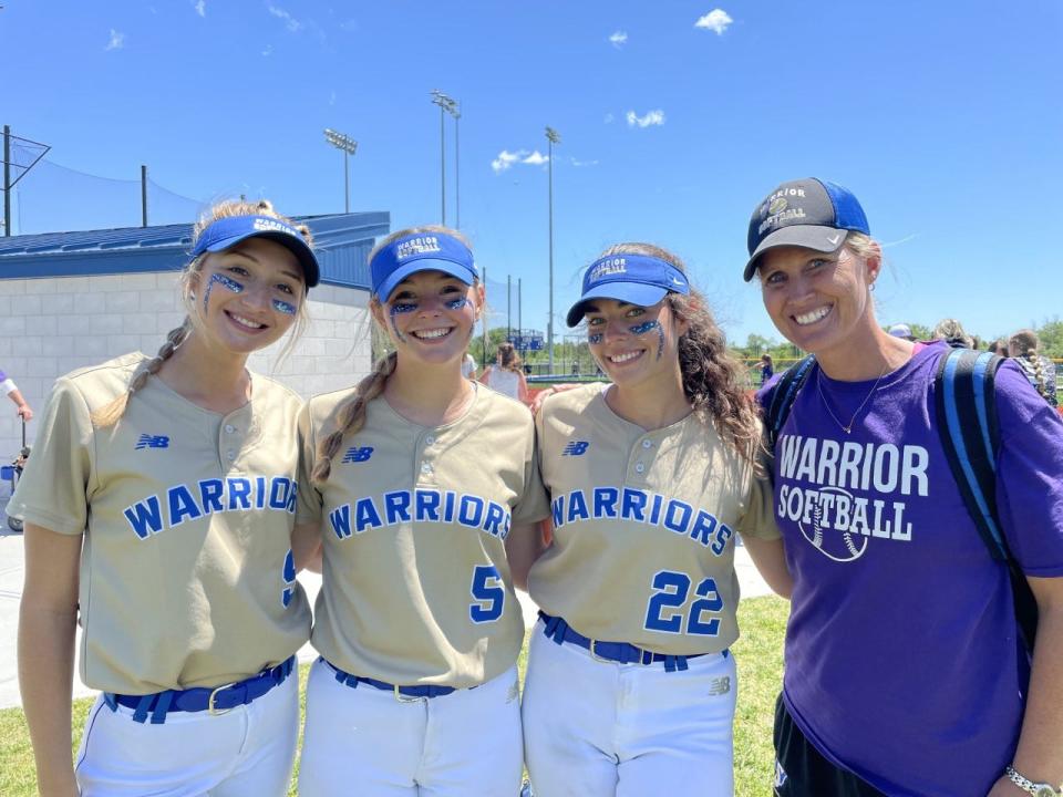 Webster Schroeder's Maddy Spakoski, Sam Schoenhardt, Molly Broccolo and coach Meaghan Keil after their 13-1 win over Section VI's Williamsville South in the Far West Regionals.