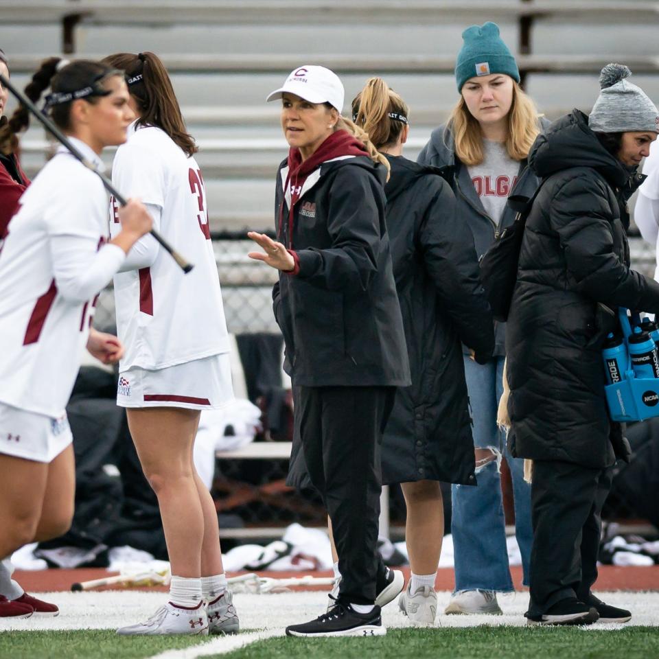 Colgate Women's Lacrosse Head Coach Kathy Taylor gives instructions to her players on the sideline during a home game at Colgate University.