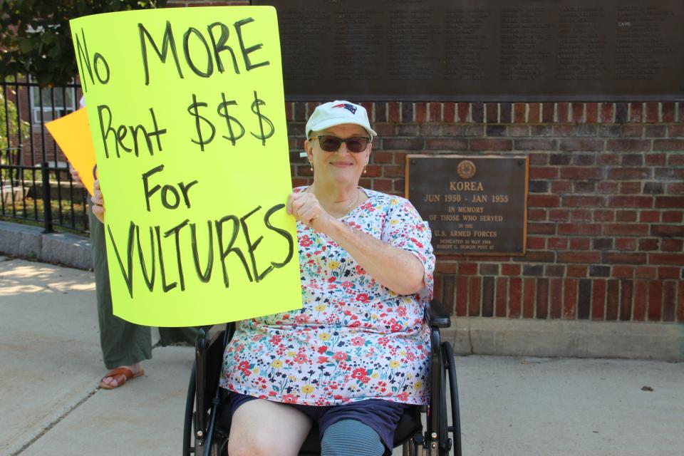 Melissa Belair, a retired Newmarket resident, takes part in a rally against rent hikes on Saturday, Sept. 10, in Newmarket.