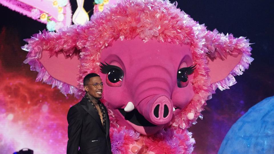 Host Nick Cannon and Baby Mammoth, “The Masked Singer” - Credit: Fox