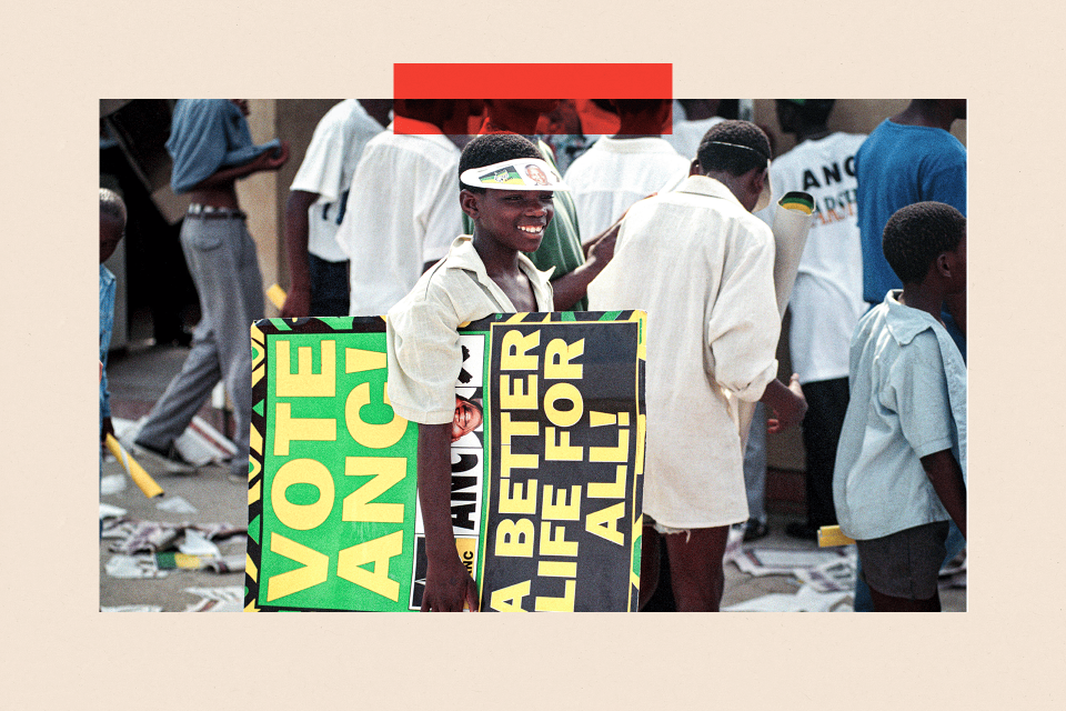 A 1994 photo of a boy carrying an ANC election poster